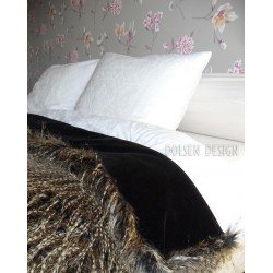 pheasant feathers imitation bedspread on bed brow / black