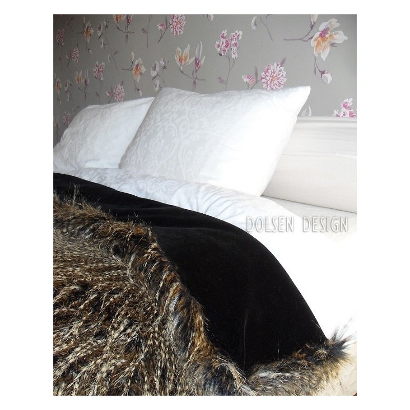 pheasant feathers imitation bedspread on bed brow / black