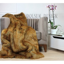 Red fox faux fur throw blanket on the armchair